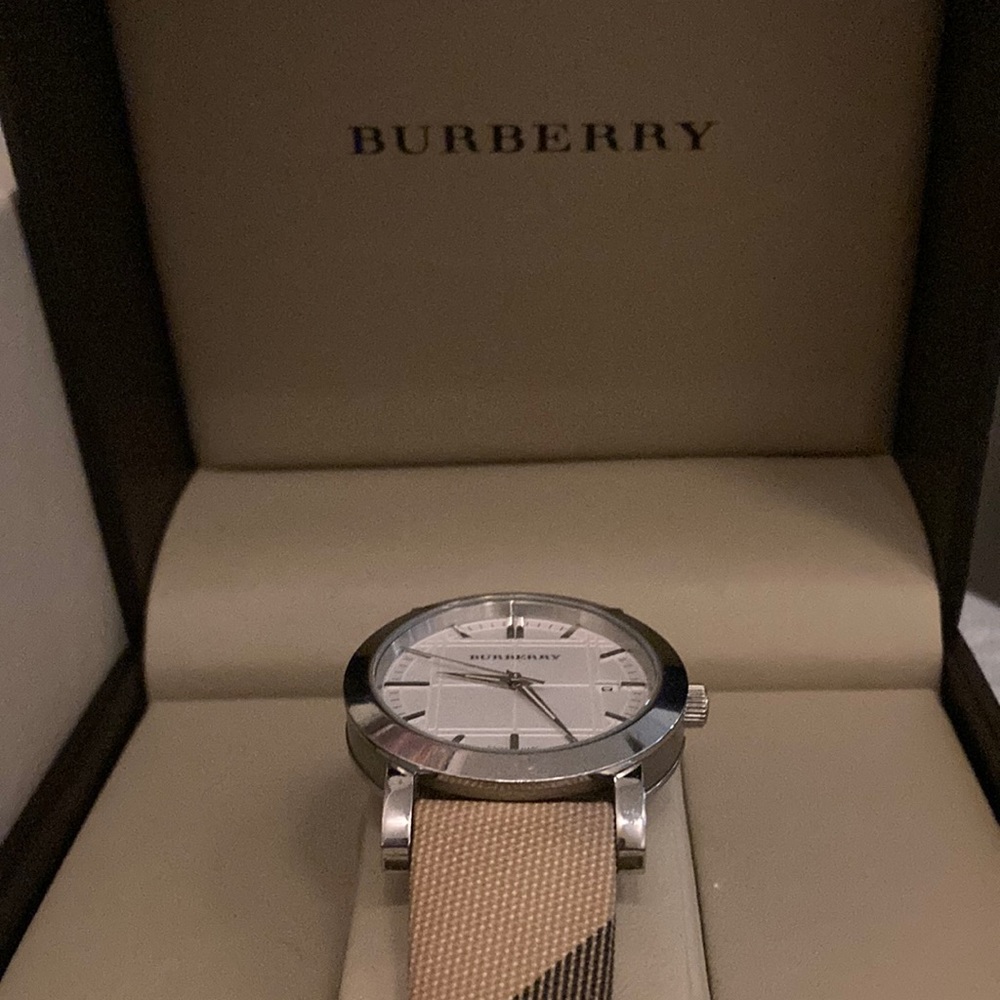 Classic Burberry watch. Canvas strap. Lightly used with tags